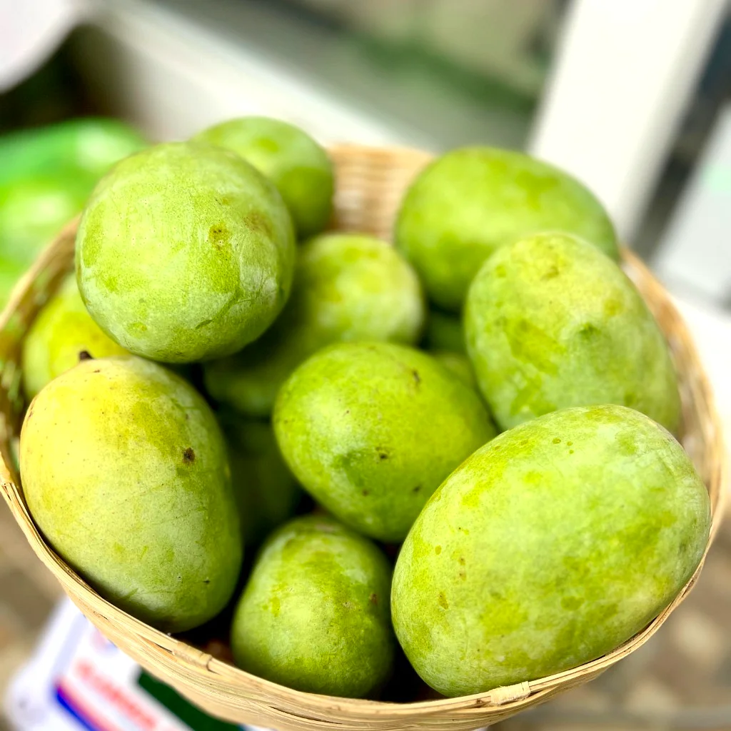 Fresh Bhagalpur Dudhia Malda Mangoes - Basket on weighing scale